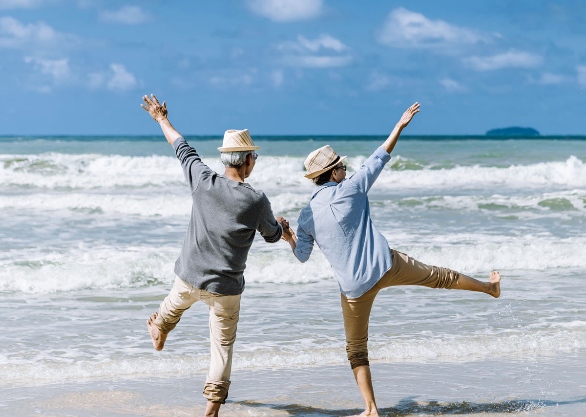 Elderly Couple On Beach