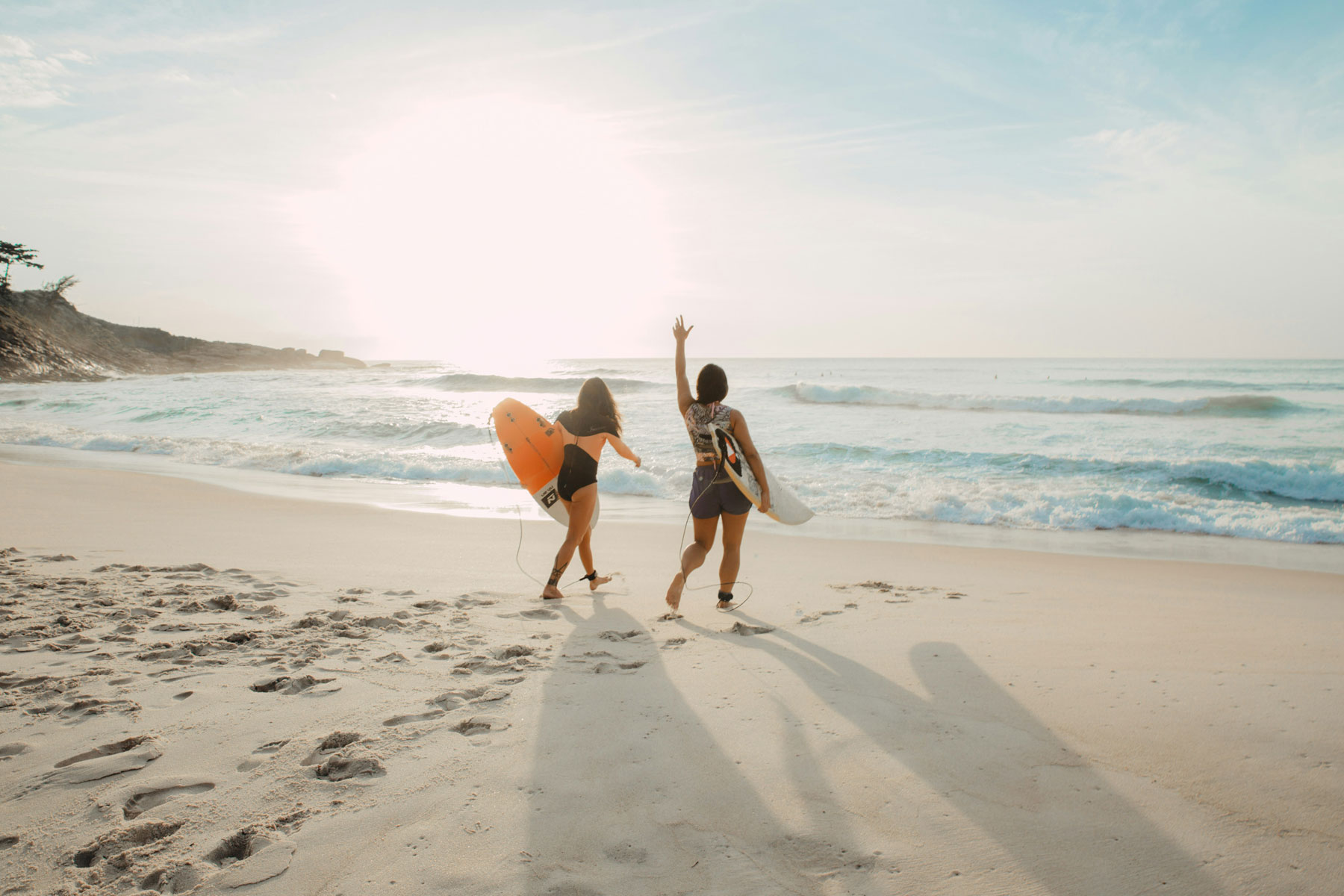 Surfers On Beach